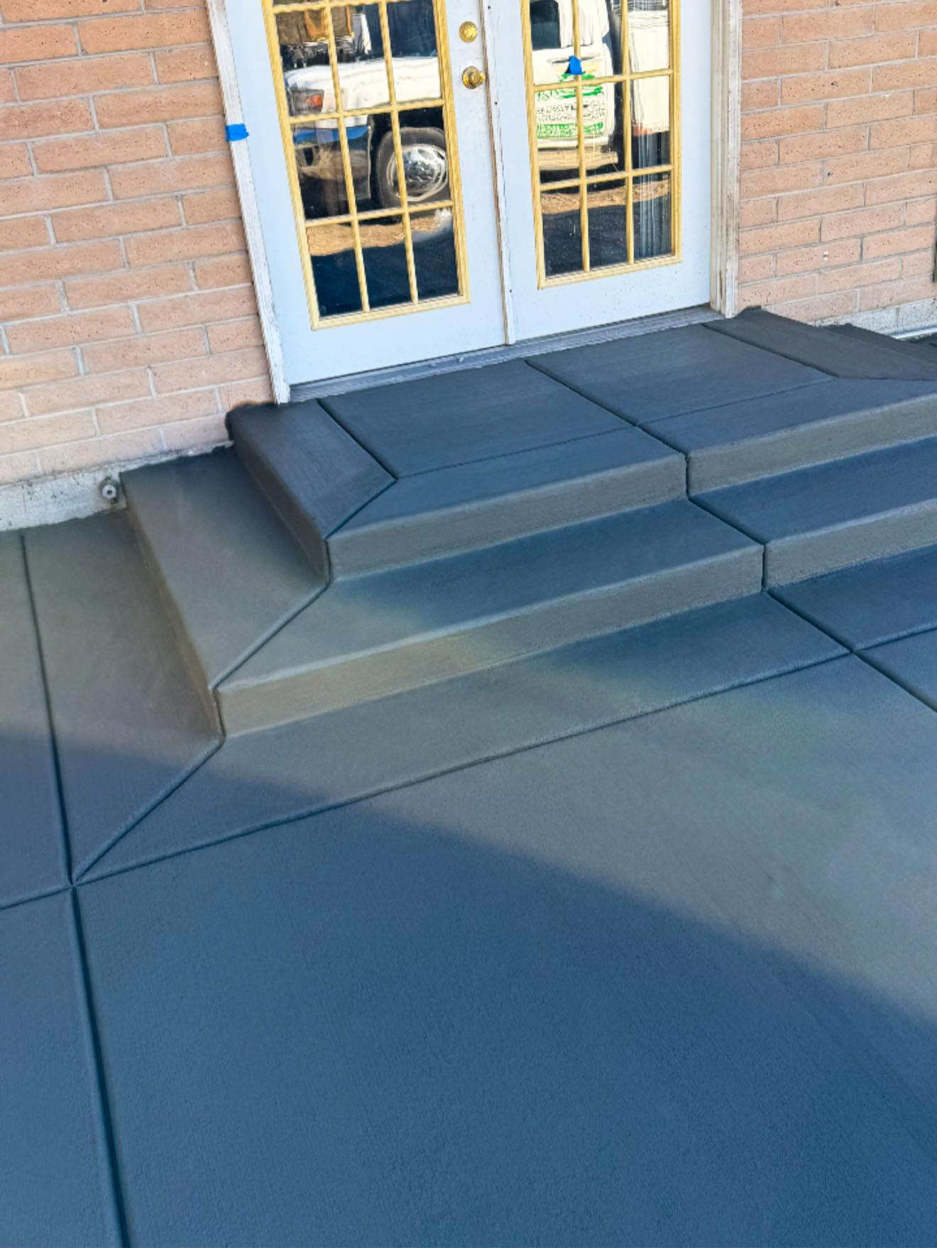 Charcoal concrete patio steps