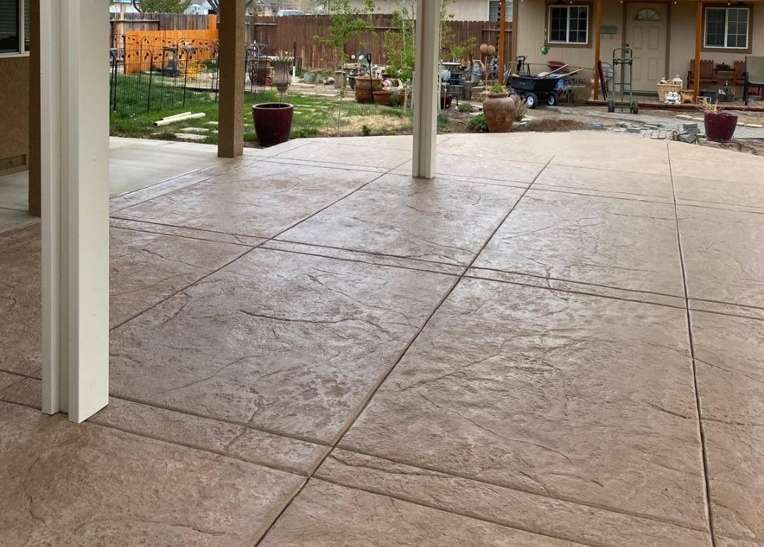 Stamped concrete travertine patio
