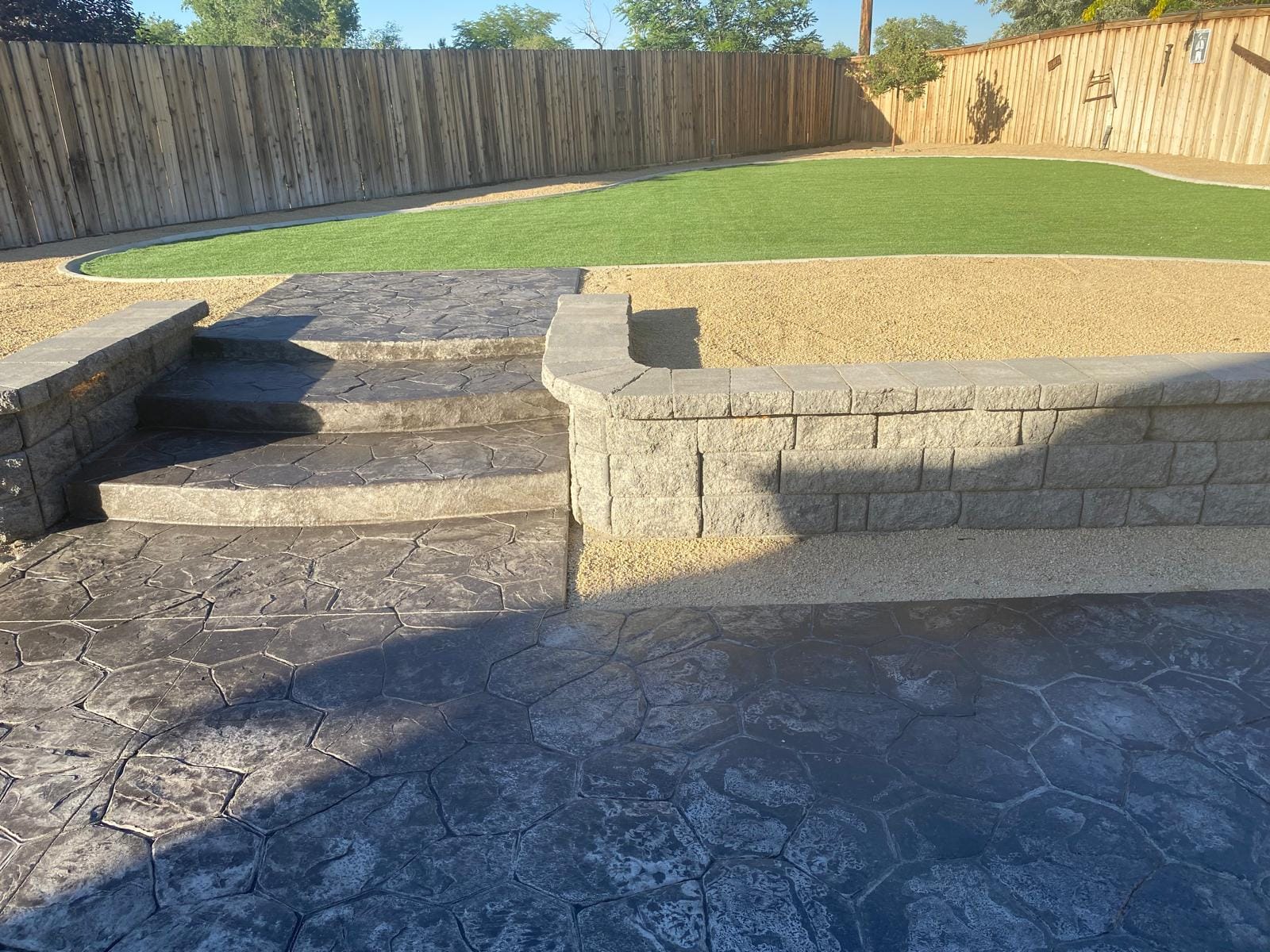 Stamped concrete steps retaining wall