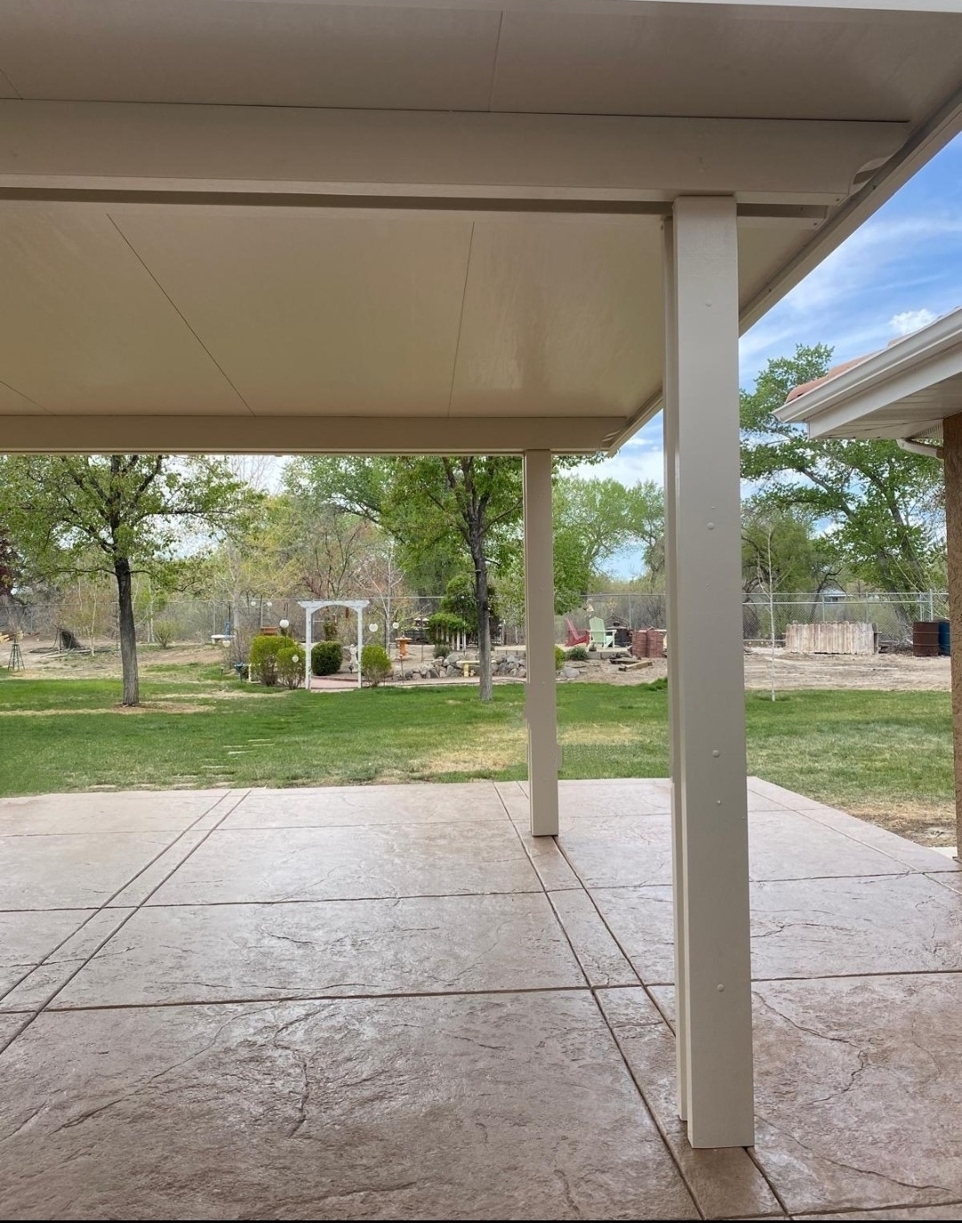 Aluminum patio cover with stamped concrete