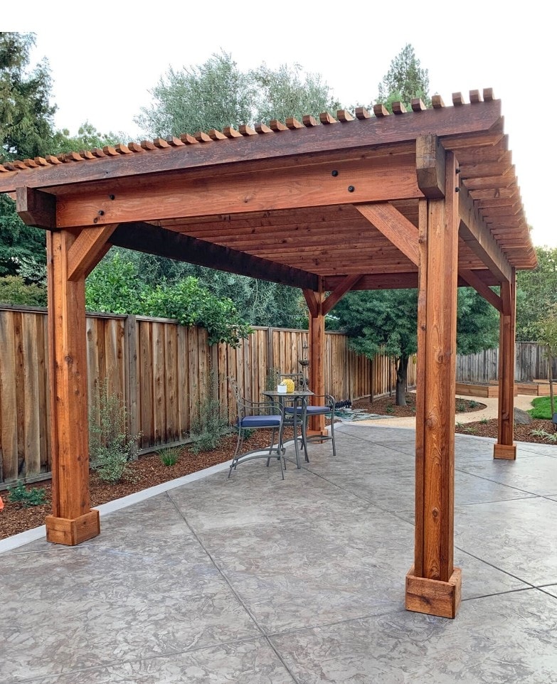 Cedar pergola over concrete patio